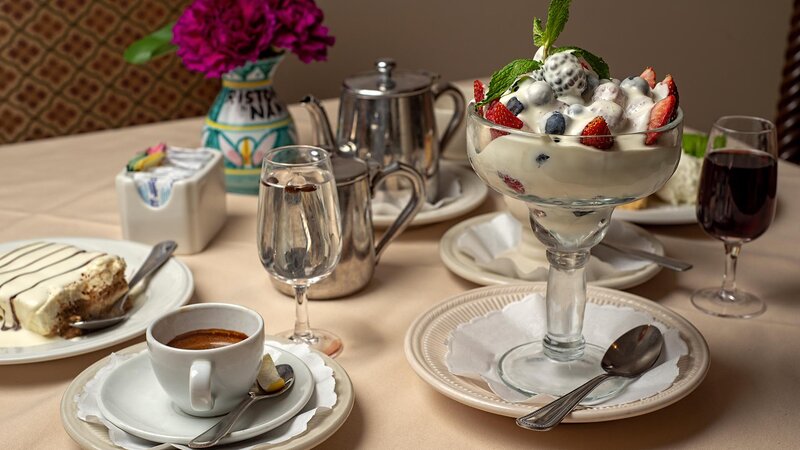 Berries and cream dessert with espresso